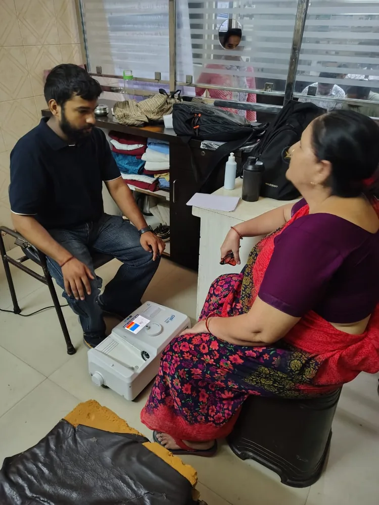 Individual bone-health screening interaction during Agra Moves Better community outreach