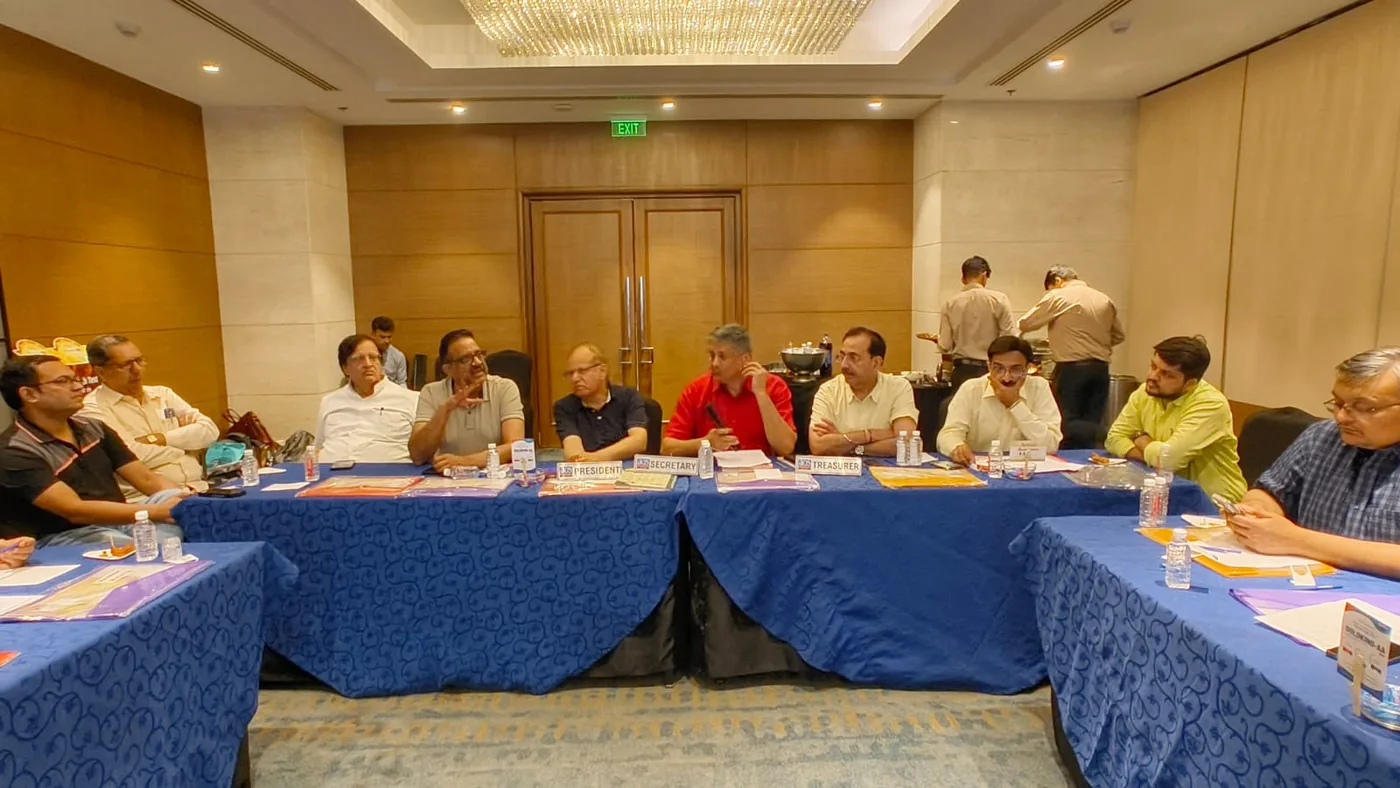 AOS members in discussion during the extended executive meeting on 4 June 2026
