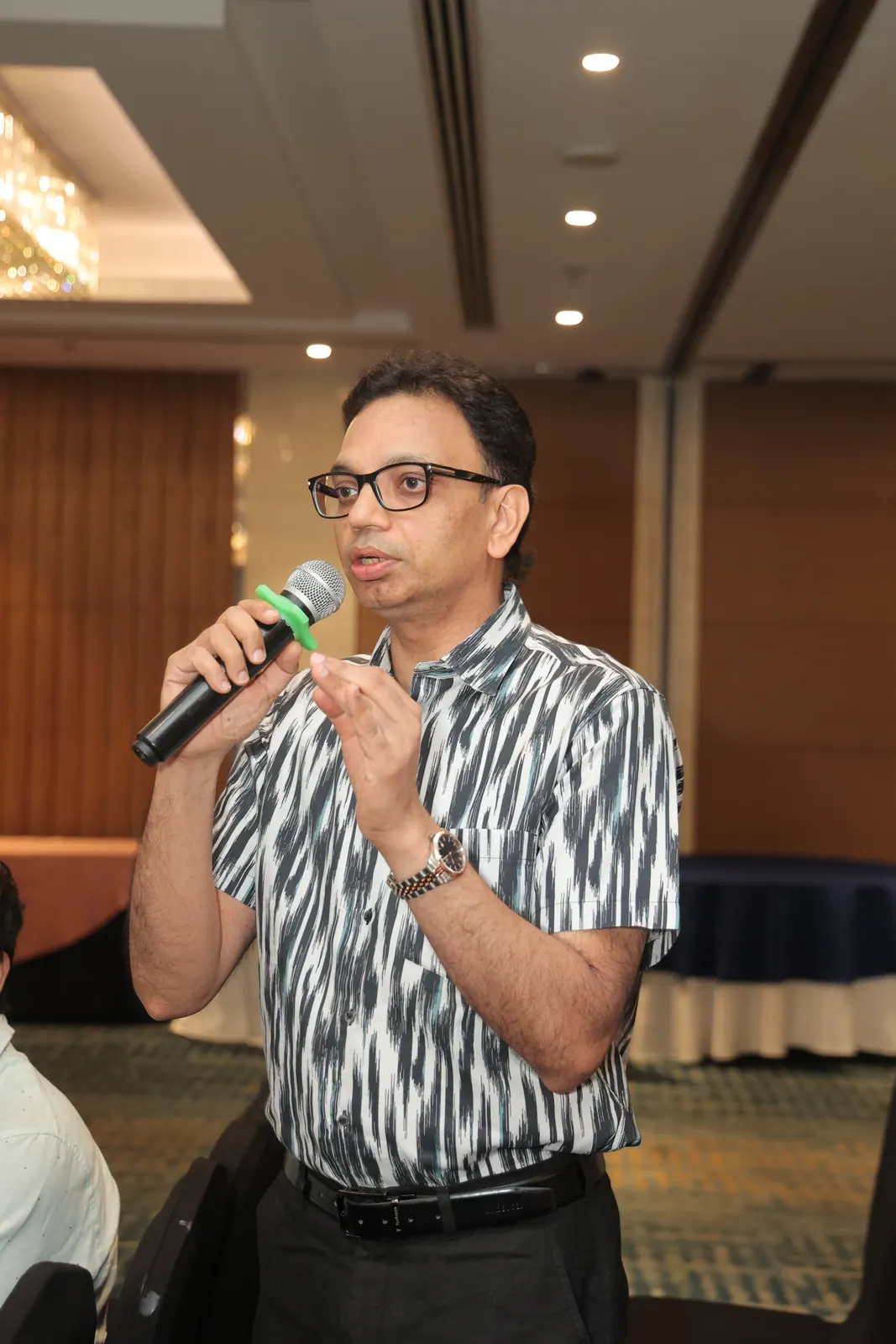 Member addressing fellow AOS members during the meeting