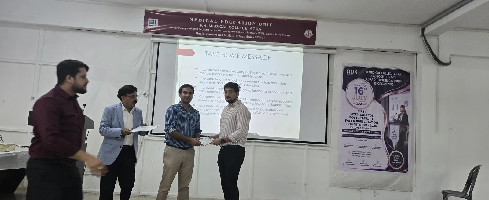 Postgraduate participant receiving recognition during the AOS competition